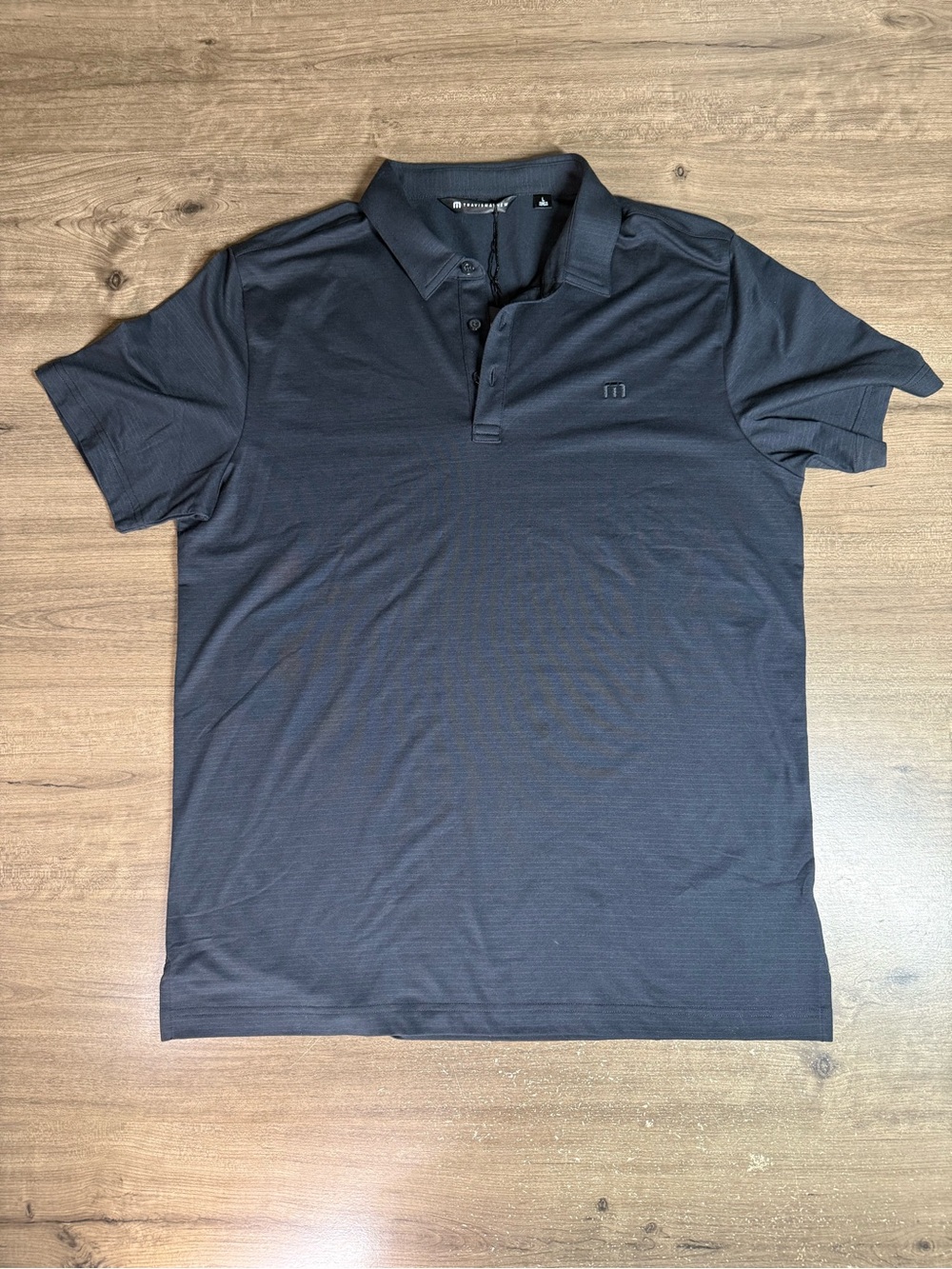 TravisMathew The Heater Polo Mens L Black Golf Performance Shirt NWT 1MW395